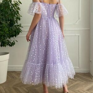Teuta Matoshi | long lavender dress with sparkly hearts